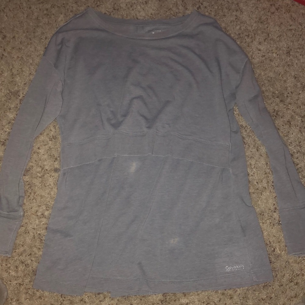 Long sleeve Calvin Klein shirt.